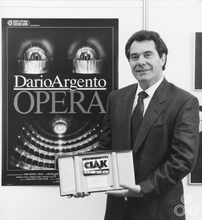 Il Ciak d'oro per il poster di Opera a Renato Casaro